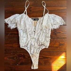 NBD X Naven Revolve White Lace Bodysuit. Size small.